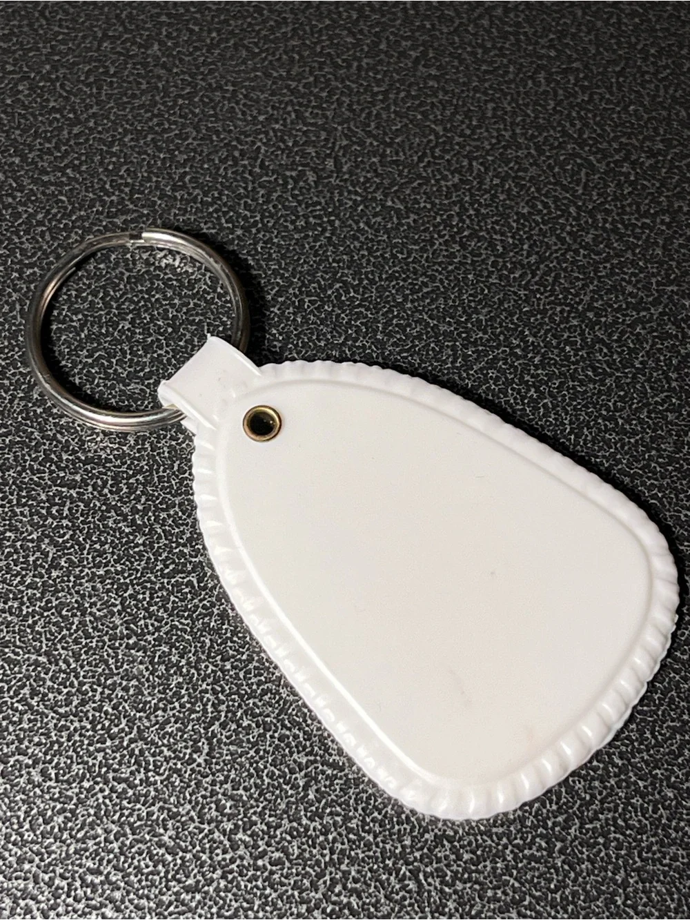 MADD White Vinyl Keychain with Green Logo